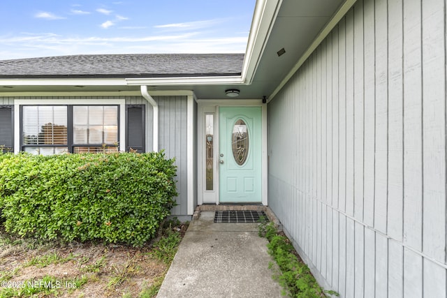 918 Arkenstone Dr, Jacksonville, FL 32225 - doorway to property featuring roof with shingles