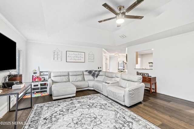 918 Arkenstone Dr, Jacksonville, FL 32225 - living room featuring ceiling fan, a tray ceiling, wood finished floors, and crown molding