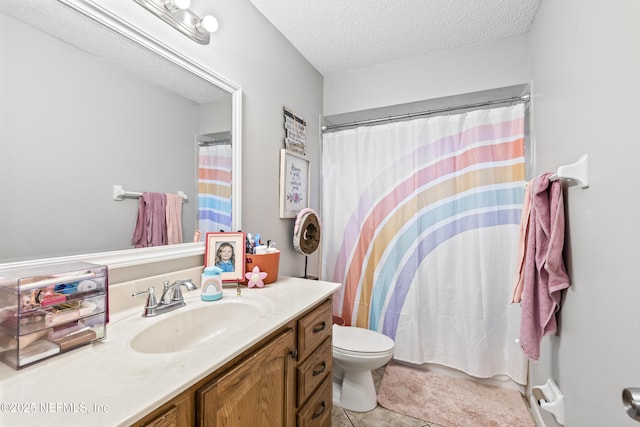 918 Arkenstone Dr, Jacksonville, FL 32225 - bathroom with vanity, toilet, a textured ceiling, tile patterned flooring, and a shower with curtain