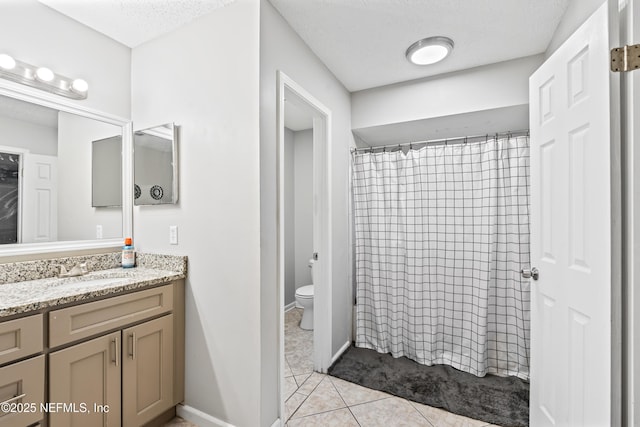 918 Arkenstone Dr, Jacksonville, FL 32225 - bathroom featuring vanity, toilet, tile patterned flooring, a textured ceiling, and curtained shower