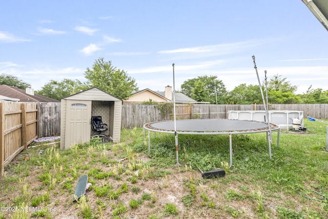 918 Arkenstone Dr, Jacksonville, FL 32225 - fenced backyard with a trampoline