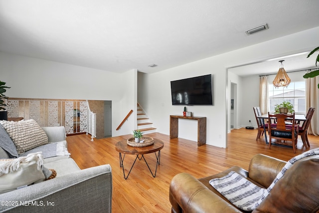 276 Baisden Rd, Jacksonville, FL 32218 - living area featuring stairs and light wood-type flooring