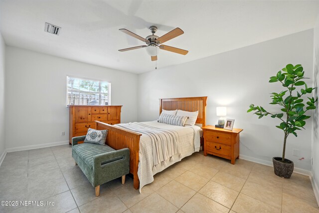 276 Baisden Rd, Jacksonville, FL 32218 - bedroom featuring baseboards, light tile patterned floors, and ceiling fan