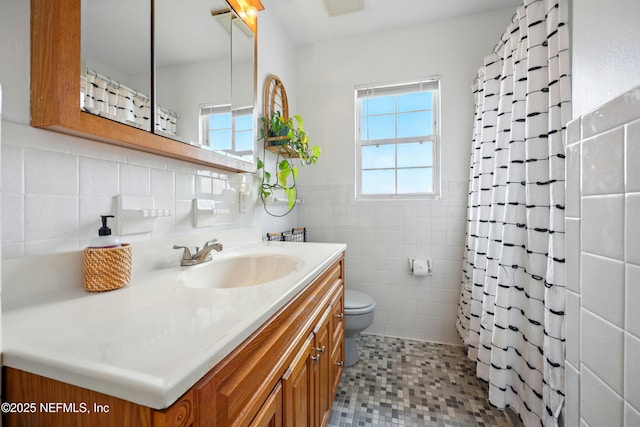 276 Baisden Rd, Jacksonville, FL 32218 - bathroom featuring tile walls, vanity, toilet, tile patterned flooring, and a shower with curtain