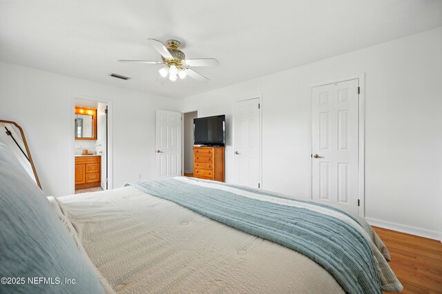 276 Baisden Rd, Jacksonville, FL 32218 - bedroom featuring baseboards, wood finished floors, and ceiling fan