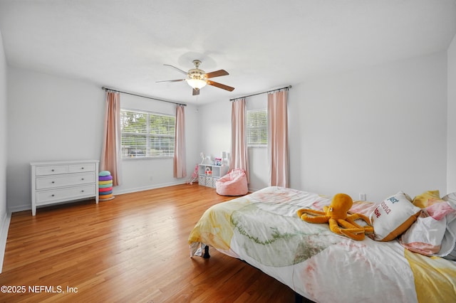 276 Baisden Rd, Jacksonville, FL 32218 - bedroom featuring wood finished floors, baseboards, and ceiling fan
