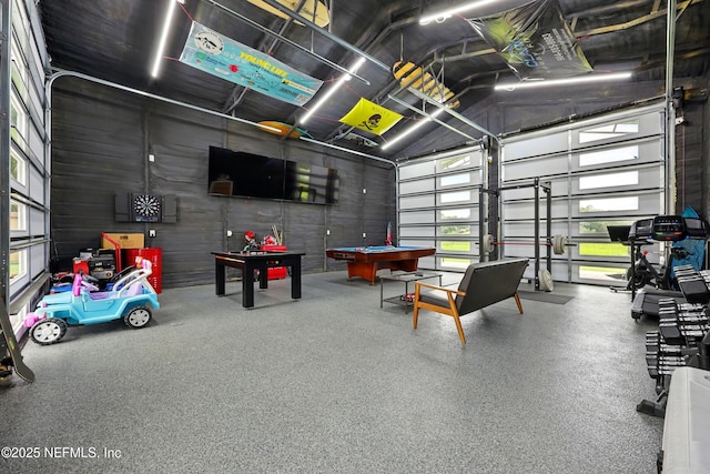 276 Baisden Rd, Jacksonville, FL 32218 - game room with a garage, high vaulted ceiling, healthy amount of natural light, and billiards