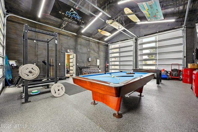 276 Baisden Rd, Jacksonville, FL 32218 - game room featuring a garage, billiards table, and a towering ceiling
