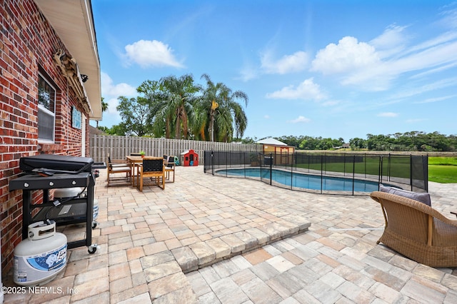 276 Baisden Rd, Jacksonville, FL 32218 - view of swimming pool featuring outdoor dining area and a patio