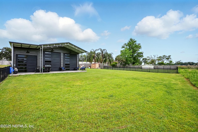 276 Baisden Rd, Jacksonville, FL 32218 - view of yard featuring an outbuilding