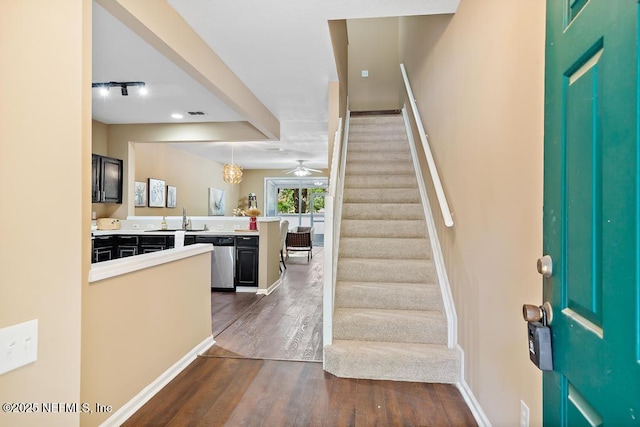 7990 Baymeadows Rd E Unit 2006, Jacksonville, FL 32256 - staircase with wood finished floors, baseboards, and a ceiling fan