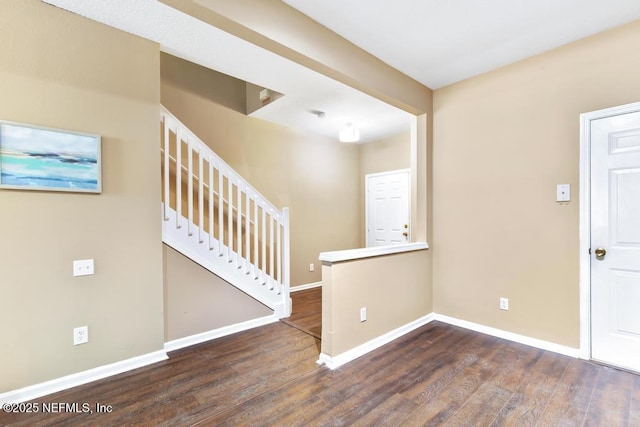 7990 Baymeadows Rd E Unit 2006, Jacksonville, FL 32256 - foyer entrance featuring wood finished floors, baseboards, and stairs
