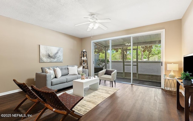 7990 Baymeadows Rd E Unit 2006, Jacksonville, FL 32256 - living room with a ceiling fan, wood finished floors, and baseboards