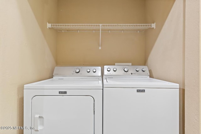 7990 Baymeadows Rd E Unit 2006, Jacksonville, FL 32256 - washroom featuring washer and clothes dryer