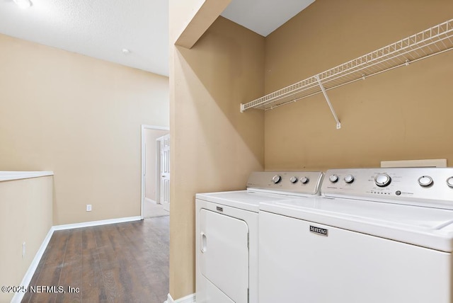 7990 Baymeadows Rd E Unit 2006, Jacksonville, FL 32256 - laundry room with separate washer and dryer, wood finished floors, and baseboards