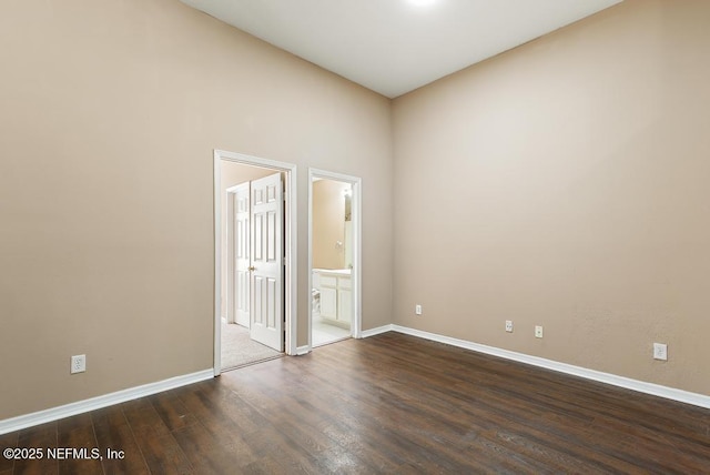 7990 Baymeadows Rd E Unit 2006, Jacksonville, FL 32256 - empty room with dark wood finished floors and baseboards