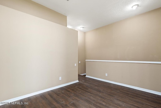 7990 Baymeadows Rd E Unit 2006, Jacksonville, FL 32256 - unfurnished room with dark wood-style flooring and baseboards