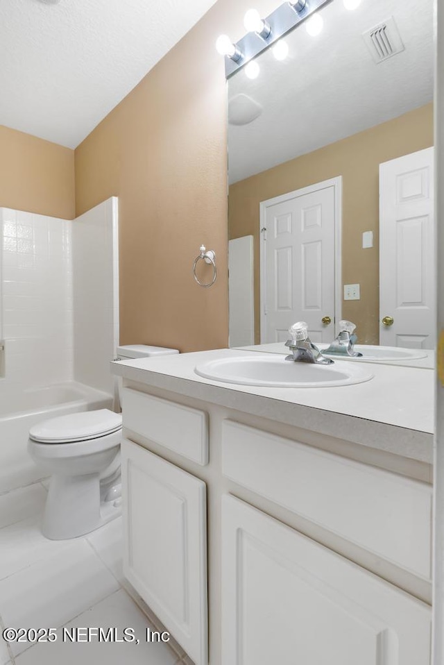 7990 Baymeadows Rd E Unit 2006, Jacksonville, FL 32256 - full bathroom with vanity, toilet,  shower combination, and tile patterned floors