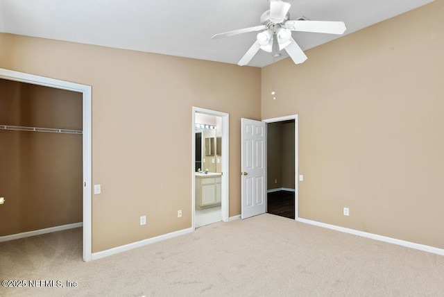 7990 Baymeadows Rd E Unit 2006, Jacksonville, FL 32256 - unfurnished bedroom with a closet, carpet floors, baseboards, and connected bathroom