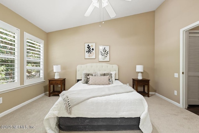 7990 Baymeadows Rd E Unit 2006, Jacksonville, FL 32256 - carpeted bedroom with baseboards, a ceiling fan, and vaulted ceiling