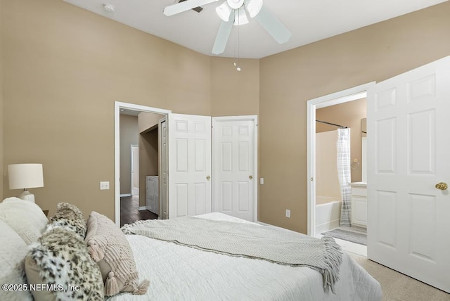 7990 Baymeadows Rd E Unit 2006, Jacksonville, FL 32256 - carpeted bedroom with ensuite bath, baseboards, and a ceiling fan
