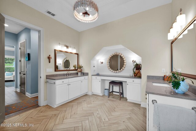 71 Deer Ridge Dr, Ponte Vedra, FL 32081 - ensuite bathroom with baseboards and two vanities