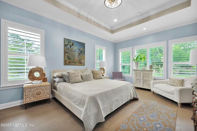 71 Deer Ridge Dr, Ponte Vedra, FL 32081 - bedroom with wood finished floors, crown molding, baseboards, a tray ceiling, and recessed lighting