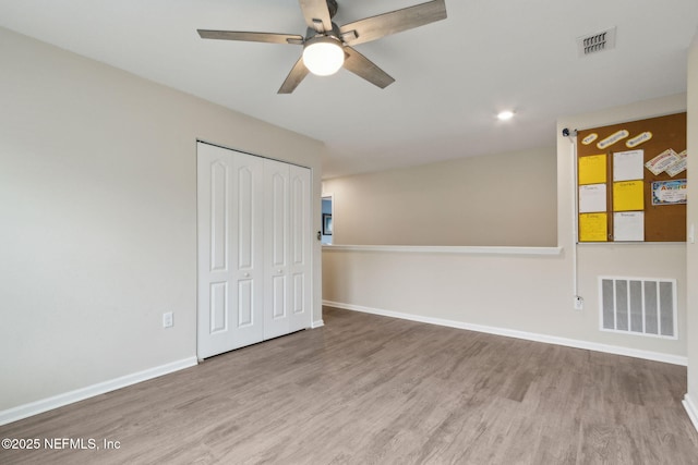 2309 Shady Breeze Ln, Green Cove Springs, FL 32043 - empty room featuring ceiling fan, wood finished floors, baseboards, and recessed lighting