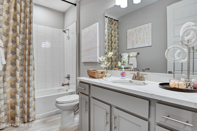 95 Elm Creek Dr, Saint Augustine, FL 32092 - bathroom with vanity, shower / bath combo with shower curtain, toilet, and wood finished floors