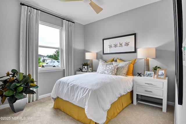 95 Elm Creek Dr, Saint Augustine, FL 32092 - bedroom featuring light carpet, baseboards, and a ceiling fan