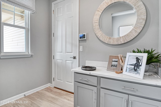 95 Elm Creek Dr, Saint Augustine, FL 32092 - bathroom featuring wood finished floors, vanity, and baseboards