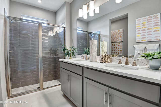 95 Elm Creek Dr, Saint Augustine, FL 32092 - bathroom with double vanity, a shower stall, tile patterned flooring, and recessed lighting