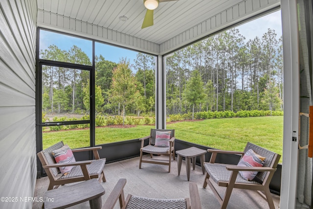 95 Elm Creek Dr, Saint Augustine, FL 32092 - sunroom with a ceiling fan and view of scattered trees