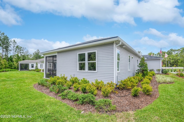 95 Elm Creek Dr, Saint Augustine, FL 32092 - view of property exterior featuring a yard and a sunroom