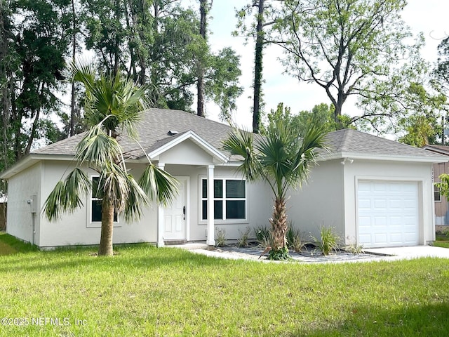 1303 Bonaventure Ave, Green Cove Springs, FL 32043 - ranch-style home with a garage, a front yard, a shingled roof, and stucco siding