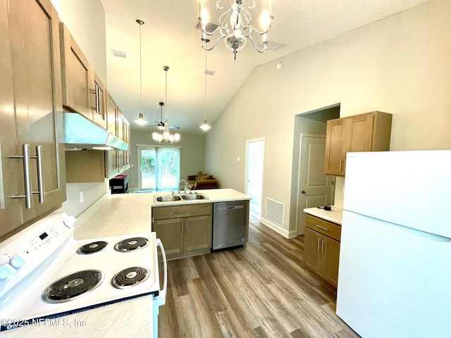 1303 Bonaventure Ave, Green Cove Springs, FL 32043 - kitchen featuring white appliances, a chandelier, a sink, under cabinet range hood, and a peninsula