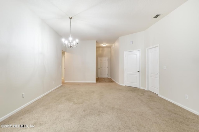 112 Glenlivet Way, Saint Johns, FL 32259 - empty room featuring a chandelier and light carpet