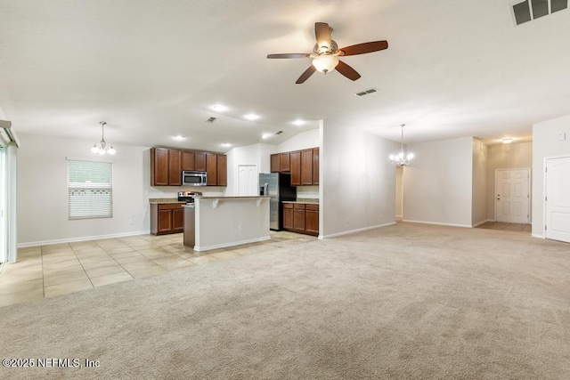 112 Glenlivet Way, Saint Johns, FL 32259 - unfurnished living room featuring a chandelier, a ceiling fan, vaulted ceiling, light carpet, and light tile patterned floors