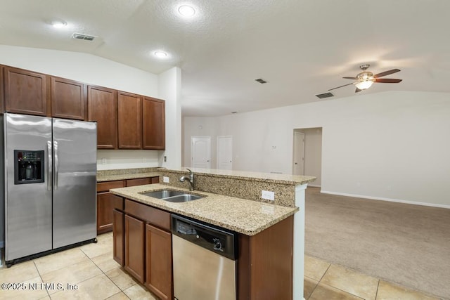 112 Glenlivet Way, Saint Johns, FL 32259 - kitchen featuring stainless steel appliances, vaulted ceiling, light carpet, open floor plan, and ceiling fan