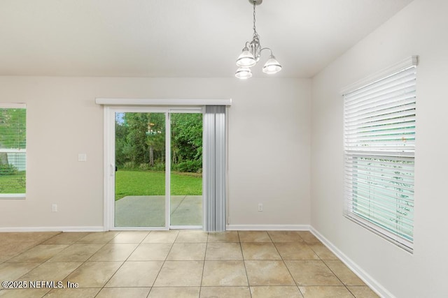 112 Glenlivet Way, Saint Johns, FL 32259 - spare room with a chandelier and light tile patterned flooring