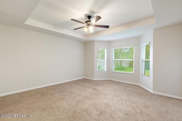 112 Glenlivet Way, Saint Johns, FL 32259 - carpeted empty room with a tray ceiling and ceiling fan