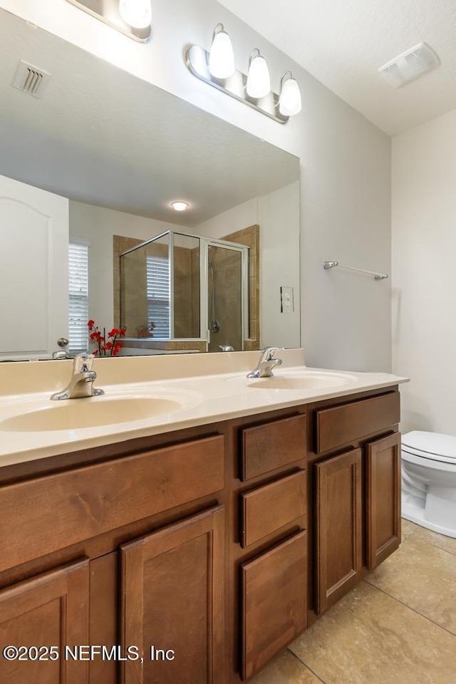 112 Glenlivet Way, Saint Johns, FL 32259 - full bathroom with double vanity, a shower stall, and tile patterned flooring