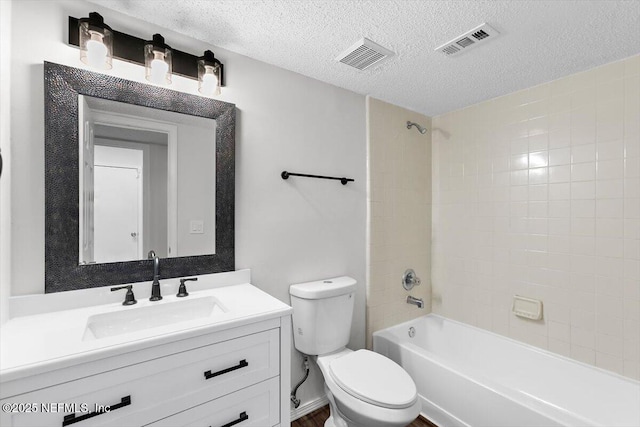 5524 Manfields Pl, Jacksonville, FL 32207 - full bath with toilet, vanity, washtub / shower combination, and a textured ceiling