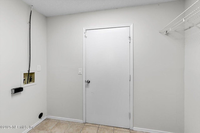 5524 Manfields Pl, Jacksonville, FL 32207 - laundry room featuring hookup for a washing machine, baseboards, and light tile patterned flooring
