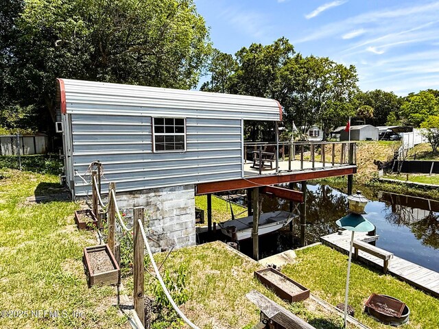 104 Waterway Ave, Satsuma, FL 32189 - dock with a yard