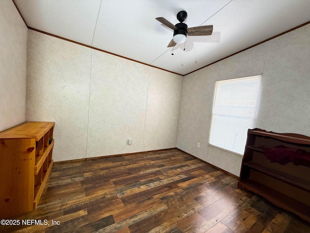 104 Waterway Ave, Satsuma, FL 32189 - unfurnished room featuring vaulted ceiling, crown molding, dark wood finished floors, and a ceiling fan