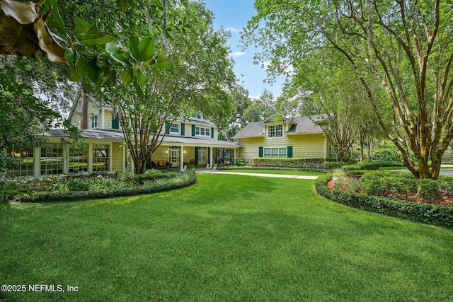 145 River Rd, Orange Park, FL 32073 - view of front of property with a front lawn and covered porch