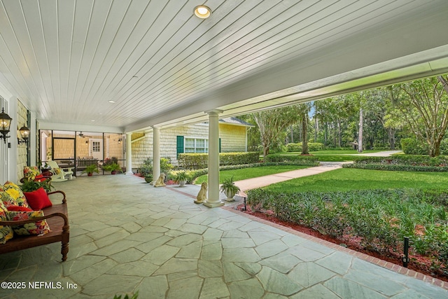 145 River Rd, Orange Park, FL 32073 - covered porch featuring a lawn