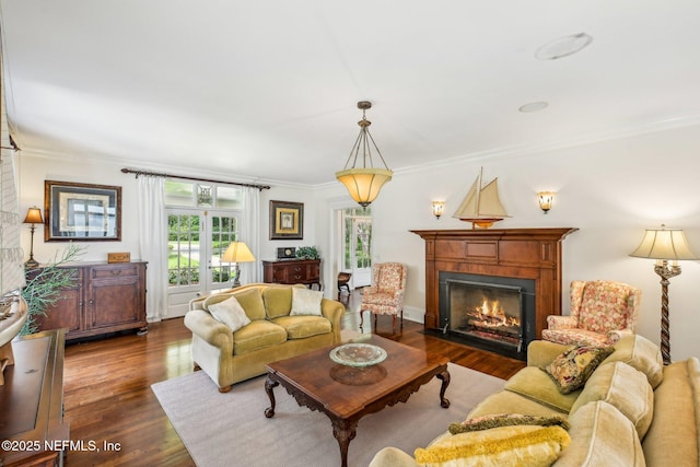 145 River Rd, Orange Park, FL 32073 - living room with crown molding, wood finished floors, and a fireplace with flush hearth