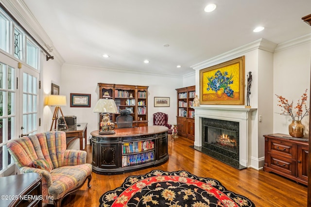 145 River Rd, Orange Park, FL 32073 - living area featuring wood finished floors, a fireplace, recessed lighting, ornamental molding, and a desk